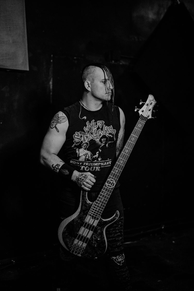 Black and white portrait with a five-string bass