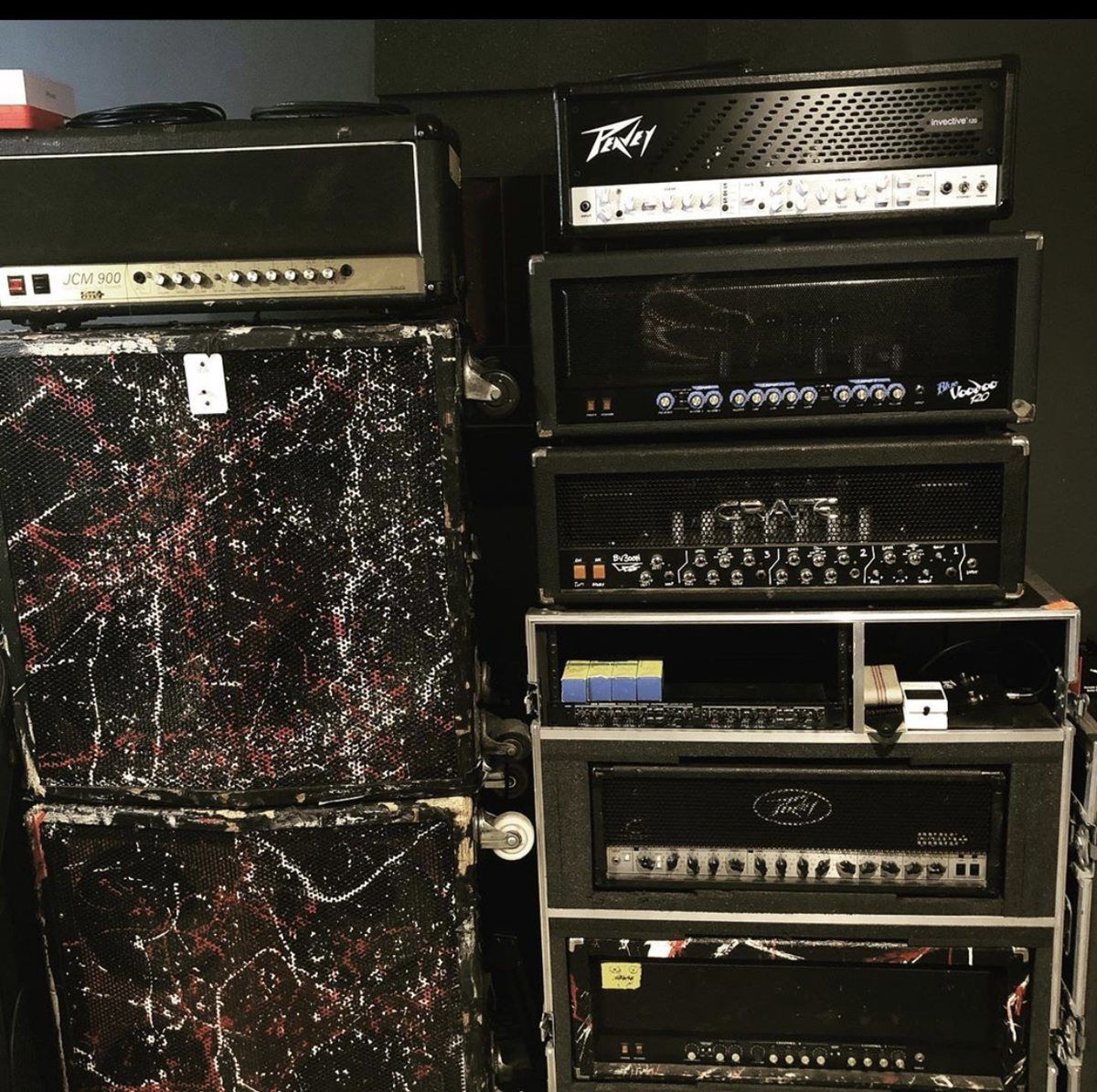 Stacked guitar amp heads including a Marshall JCM900 and Peavey Invective at Redshift Recording